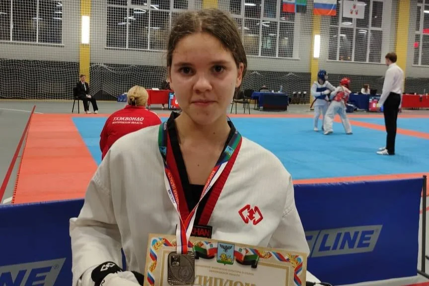 Спортсмены тхэквондо на соревнованиях